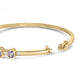 Yellow Gold Alternating Baguette-Cut Bezel-Set Oval-Shaped Tanzanite and Diamond Bangle Bracelet