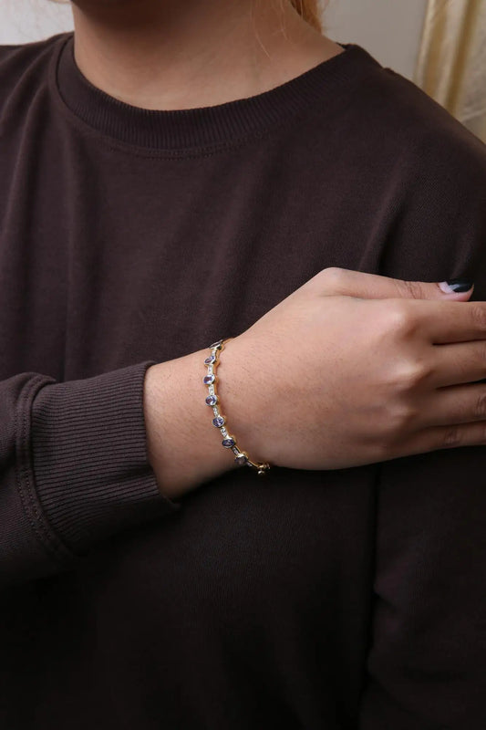 Yellow Gold Round-Cut Diamond and Oval-Cut Blue Tanzanite Bangle Bracelet