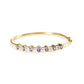 Yellow Gold Alternating Baguette-Cut Bezel-Set Oval-Shaped Tanzanite and Diamond Bangle Bracelet